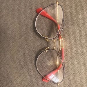 Miu miu gold and red eye glasses. Vmu 53p